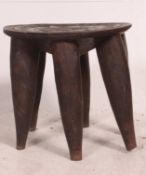 An African Nupe tribal stool of classic