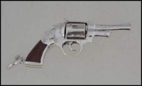 An unusual silver 925 revolver with wood