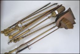 A harlequin brass fire side companion s