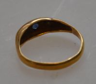 A hallmarked 22ct gold antique sapphire