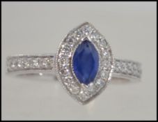 An 18ct white gold sapphire and diamond