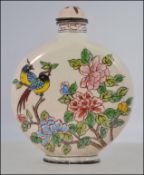 A Chinese enamel on brass perfume bottle