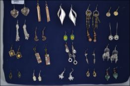 A collection of twenty earrings of diffe