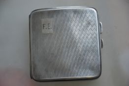 A silver hallmarked cigarette case havin