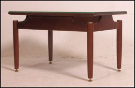 A retro Ernest Gomme teak wood coffee ta