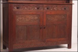 A Victorian Maple & Co carved oak court