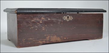 A Victorian walnut and inlaid music box,