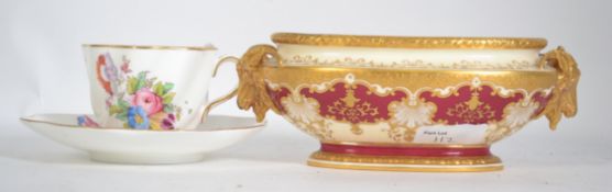 A Coalport cup and saucer the cup having