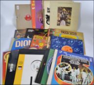 A collection of vinyl long play and 12