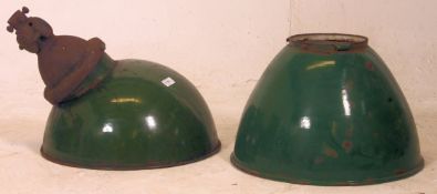 A pair of vintage enamel two tone green