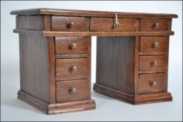 A 20th century Apprentice piece twin ped