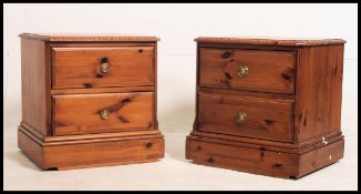 A pair of antique style pine bedside dra