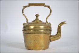 A Victorian miniature brass kettle compe