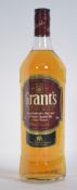 A litre bottle of Grant's Blended Scotch Whisky Family Reserve whiskey.