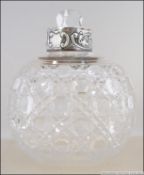 A Richard Burbridge for Harrods Ltd 20th century large silver hobnail cut glass scent - perfume