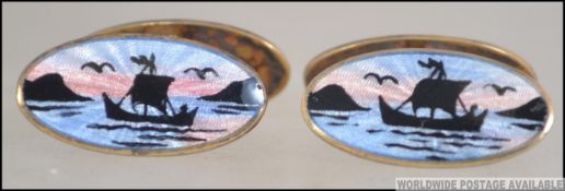 A pair of David Andersen Scandinavian silver 925 enamel cufflinks with scene of deer and viking