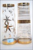 Two 1950's vintage glass vases one having gold banding the other having gold star decoration.