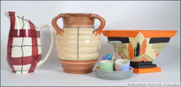 A 1930's Art Deco vase by Myott & Sons 9185 together with a 3 handled ribbed vase by Crown Ducal in