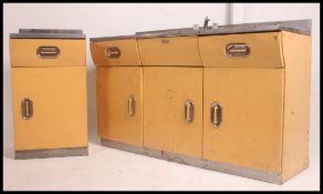 A mid twentieth century 1950's original English Rose Kitchen pedestal cabinet and sink unit dresser.