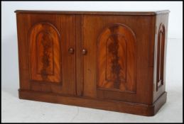 A Victorian flame mahogany side cabinet with plinth base ,