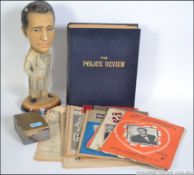 A collection of items to include some vintage Police Review magazines, sheet music,