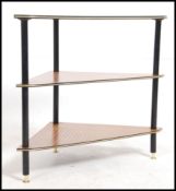 A vintage retro 1960's / 70's three tier corner table with cross grain detailed top.