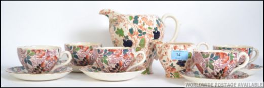 An early 20th century tea service by Royal Cauldon in the ' Jacqueline ' pattern consisting of cups,
