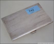 A good early 20th century silver ( tested ) cigarette case with bark decoration having inset