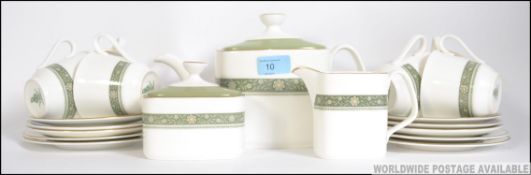 A Royal Doulton tea service in the Rondelay pattern consisting of cup's, saucers, side plates,