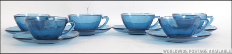 A stunning 1970's retro French made pressed blue glass coffee / set.