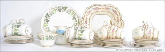 A 20th century Aynsley ceramic part tea service together with a Wedgwood Santa Clara pattern part