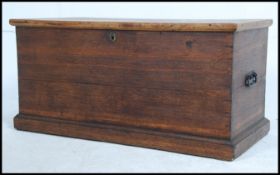A Victorian country oak blanket box - chest coffer having a plinth base with hinged top above,