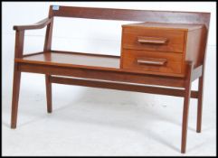 A good retro 1960's Danish influence teak wood telephone / hall table.
