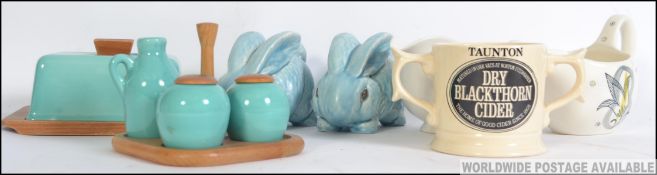 A collection of retro ceramic / porcelain items to include a retro Bisto advertising sauce boat,