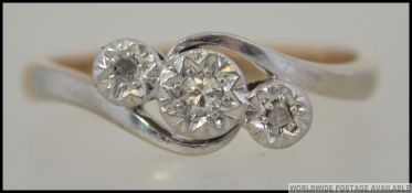 A vintage 9ct gold and platinum diamond ring.