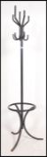 A retro 1960's tubular metal coat stand of ebonised form with shaped base and hooks atop (