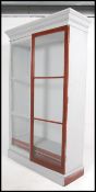 A large Victorian painted grey shabby chic mahogany shop - museum display cabinet of very large