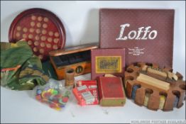 A collection of games to include an early wooden poker chip set with 2 packs of Bristol playing