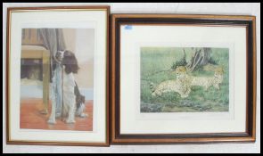 A framed and glazed limited edition signed print of two leopards entitled ' A Distant Movement '