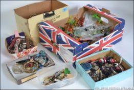 A large collection of costume jewellery from the 20th century to include butterfly brooches,