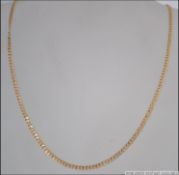 A 9ct gold ladies omega linked necklace with lobster clasp. Length 50cms.