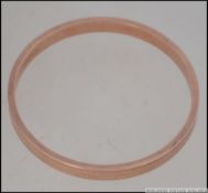 A 9ct gold hallmarked rose gold slave bangle.