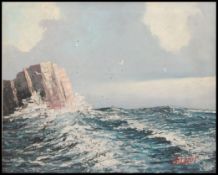 A framed oil on canvas of fishermen and trawlers signed by J Howard along with another maritime oil