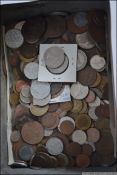A box of assorted vintage coins and currency. Mostly 20th century, some Victorian / 19th century.