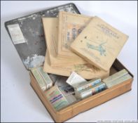 A collection of vintage cigarette cards.