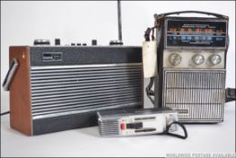 A vintage teak cased Roberts portable radio,