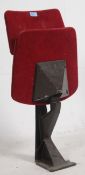 A 1930's Art Deco single cinema chair having velour upholstered seat and back rests on metal