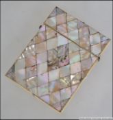 A 19th century Victorian mother of pearl chequer inlaid card case having hinged top with lined