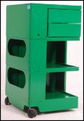 A retro 1970's Joe Columbo Boby trolley in green standing on castors and having t twist out drawers,