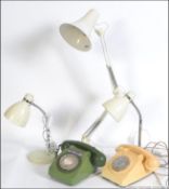 A group of three retro mid century desk lamps to include two gooseneck's and a anglepoise style